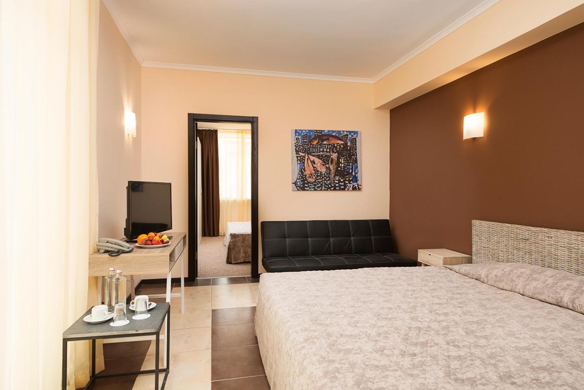 Family Suite (3 Adults + 1 Child or 4 Adults)