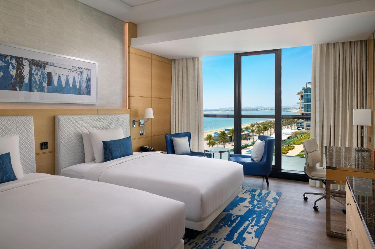 Grand Deluxe Room 2 Double Beds Partial Sea View Private Balcony Beachfront Resort