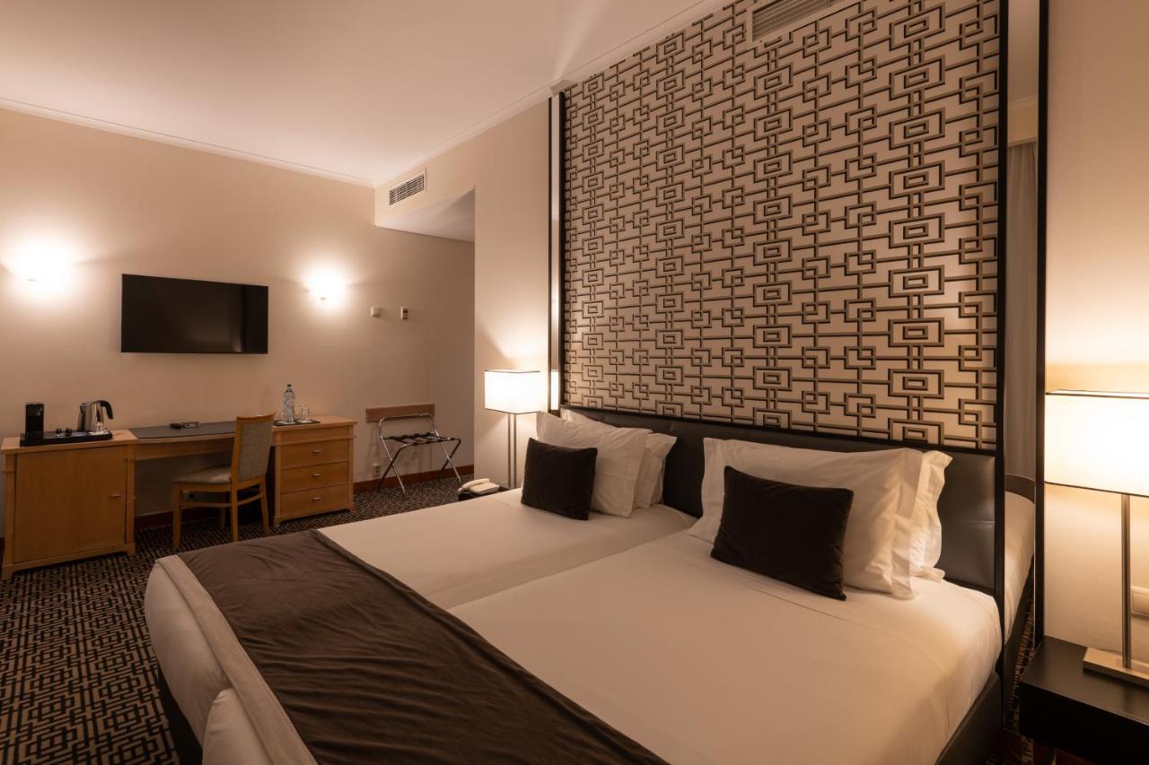 Quarto Deluxe com Cama de Casal ou 2 de Solteiro e Varanda