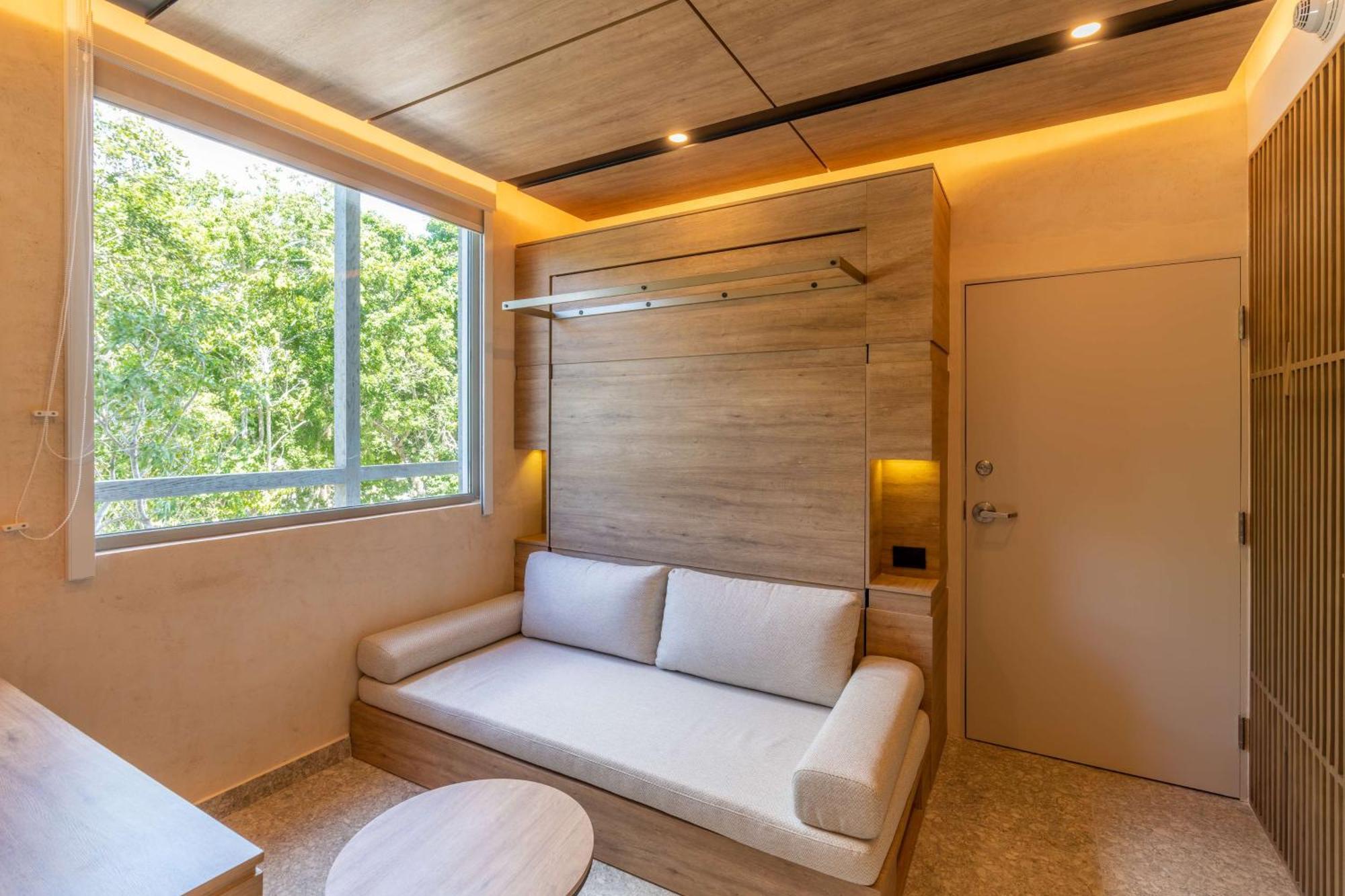 Flex Room with One Queen Wall Bed and Roof Top Access
