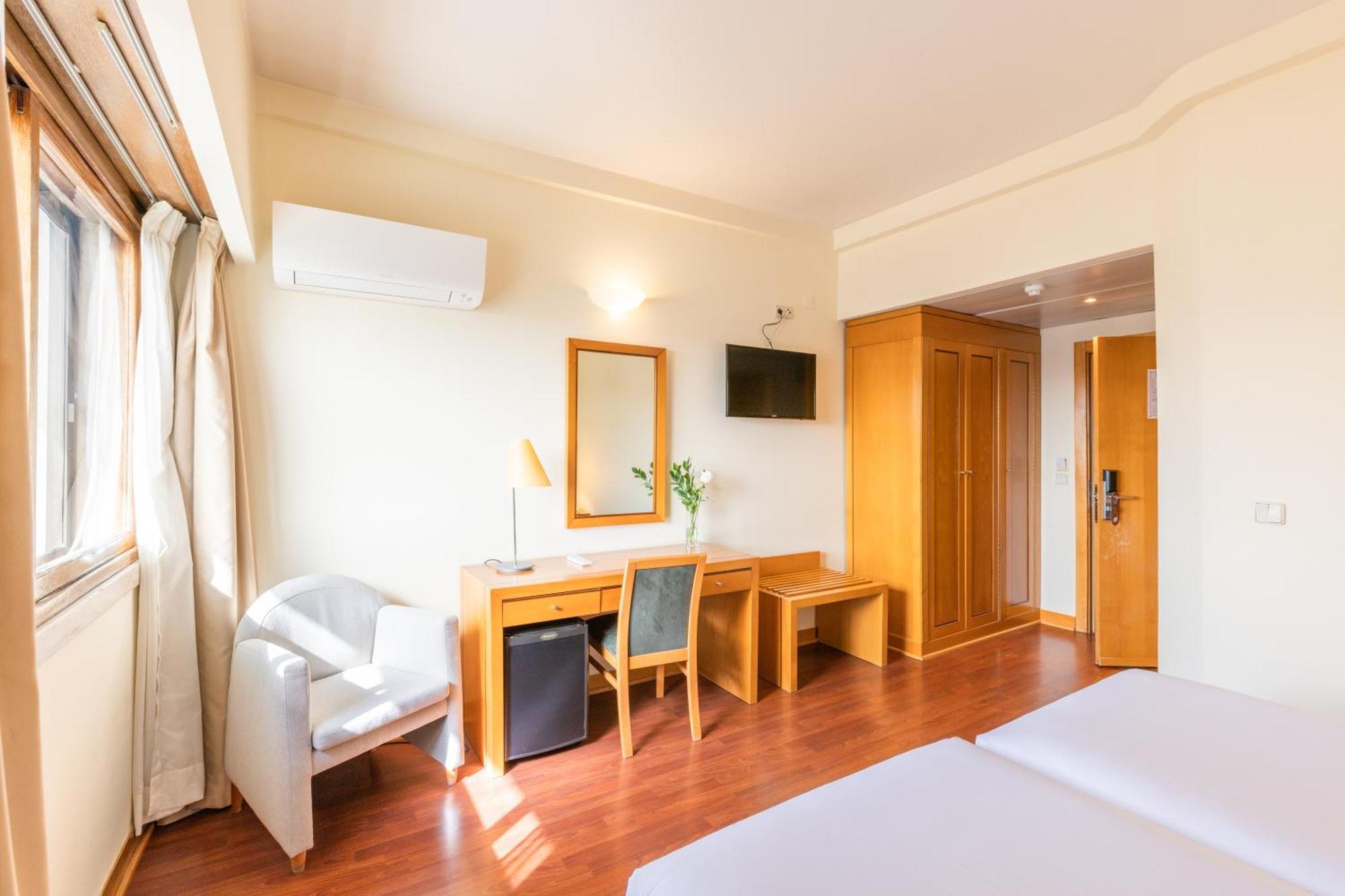 Quarto Standard com Cama de Casal ou 2 de Solteiro