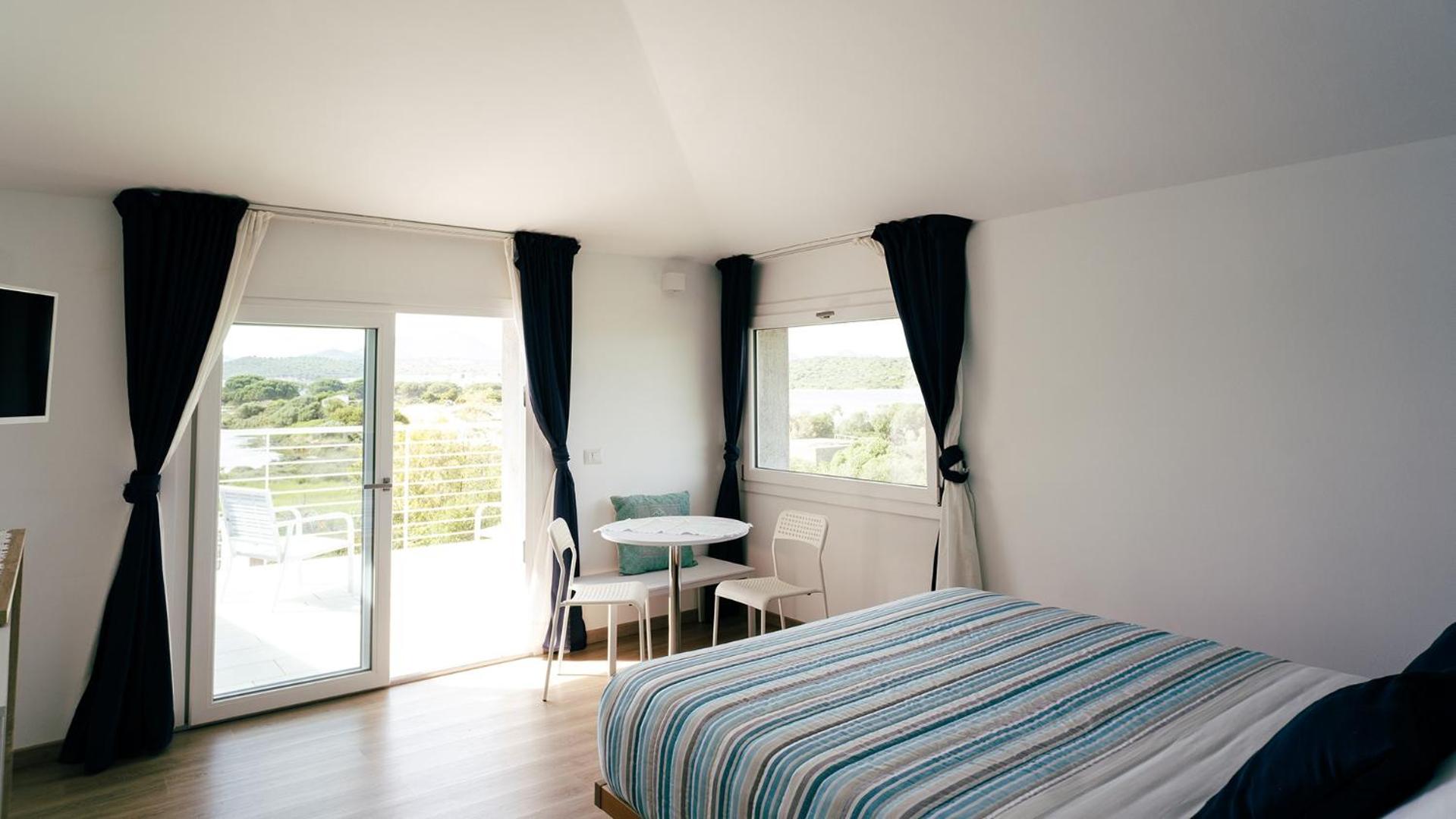 Zimmer mit Queensize-Bett und Meerblick