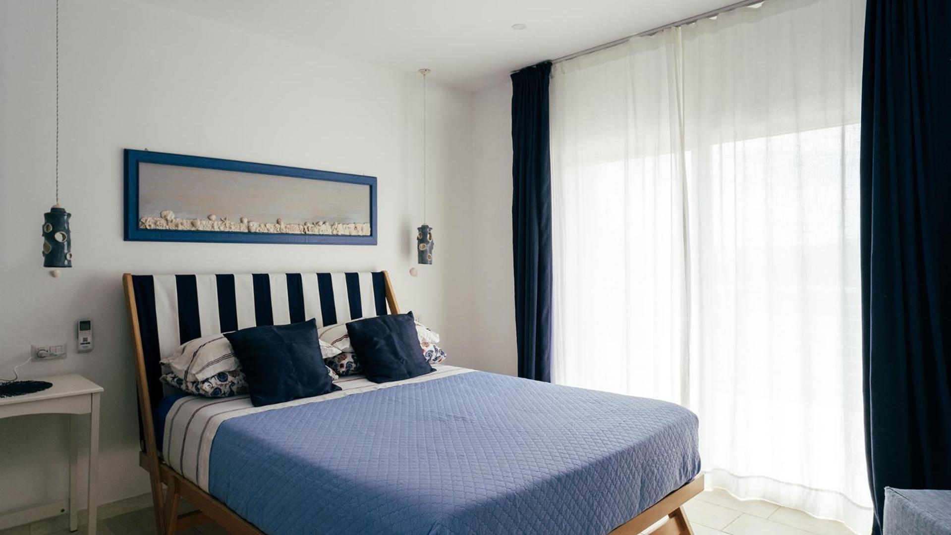 Doppelzimmer mit Balkon und Meerblick