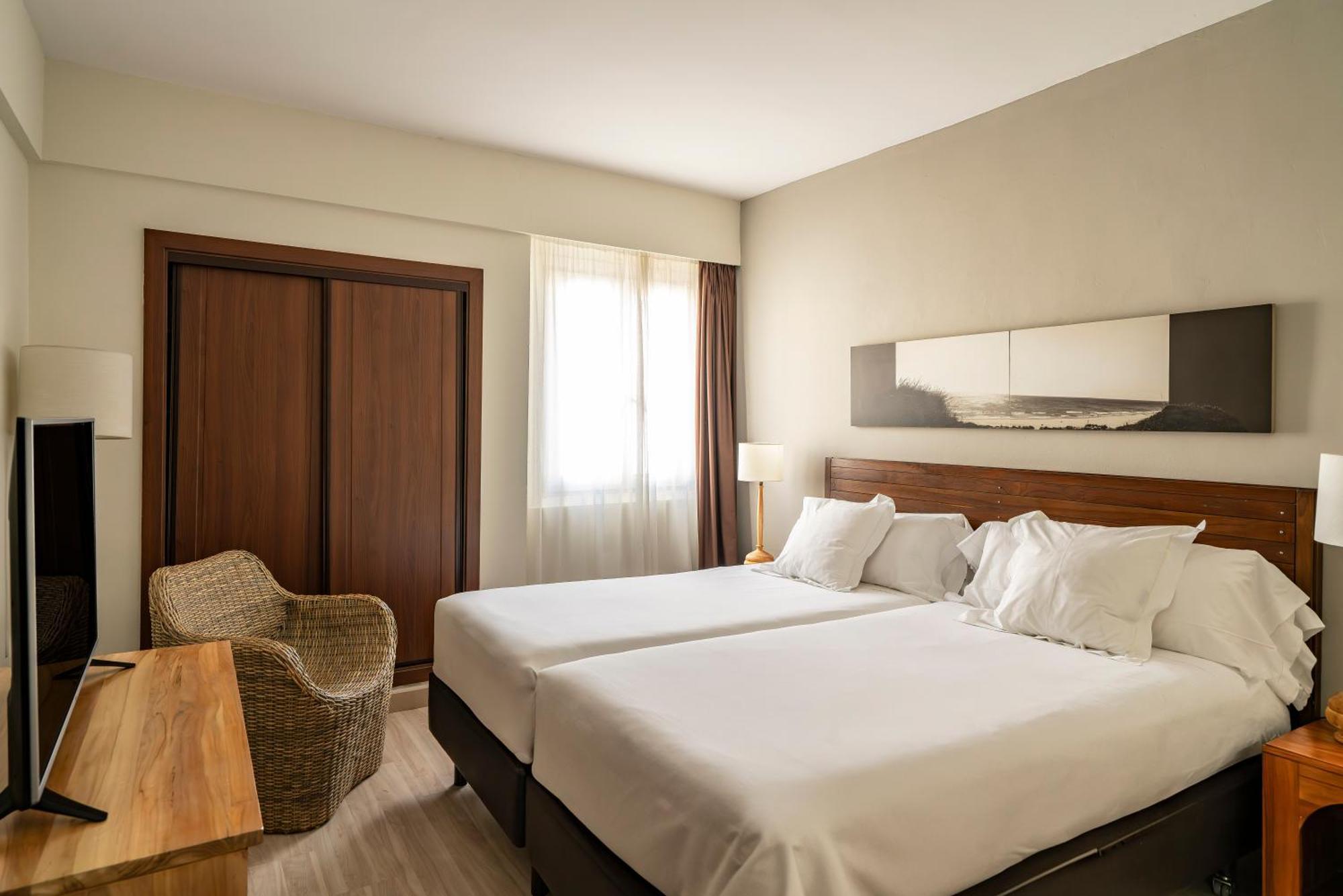 Suite Junior (2 adultos + 2 niños)