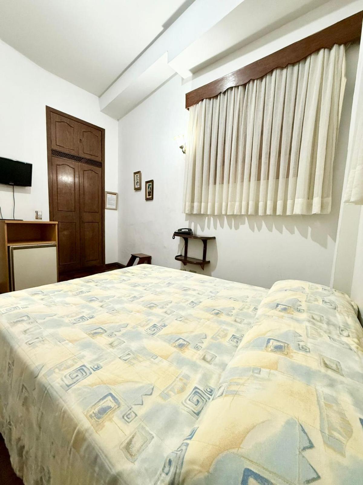 Quarto Duplo