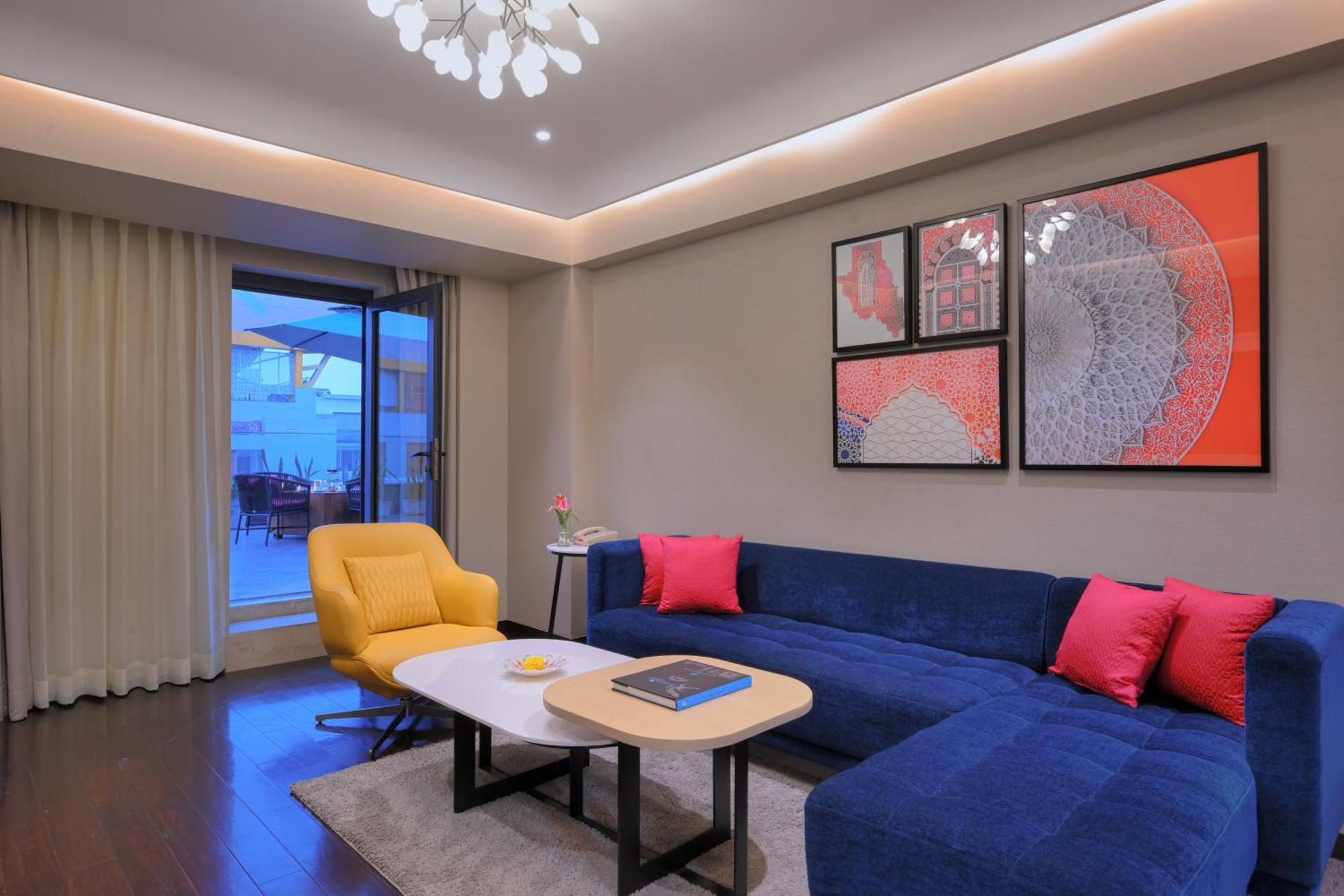 Executive Suite Room seating area terrace on food beverage spa laundry | 11 IMFL Happy Hours from 6 to 8 pm