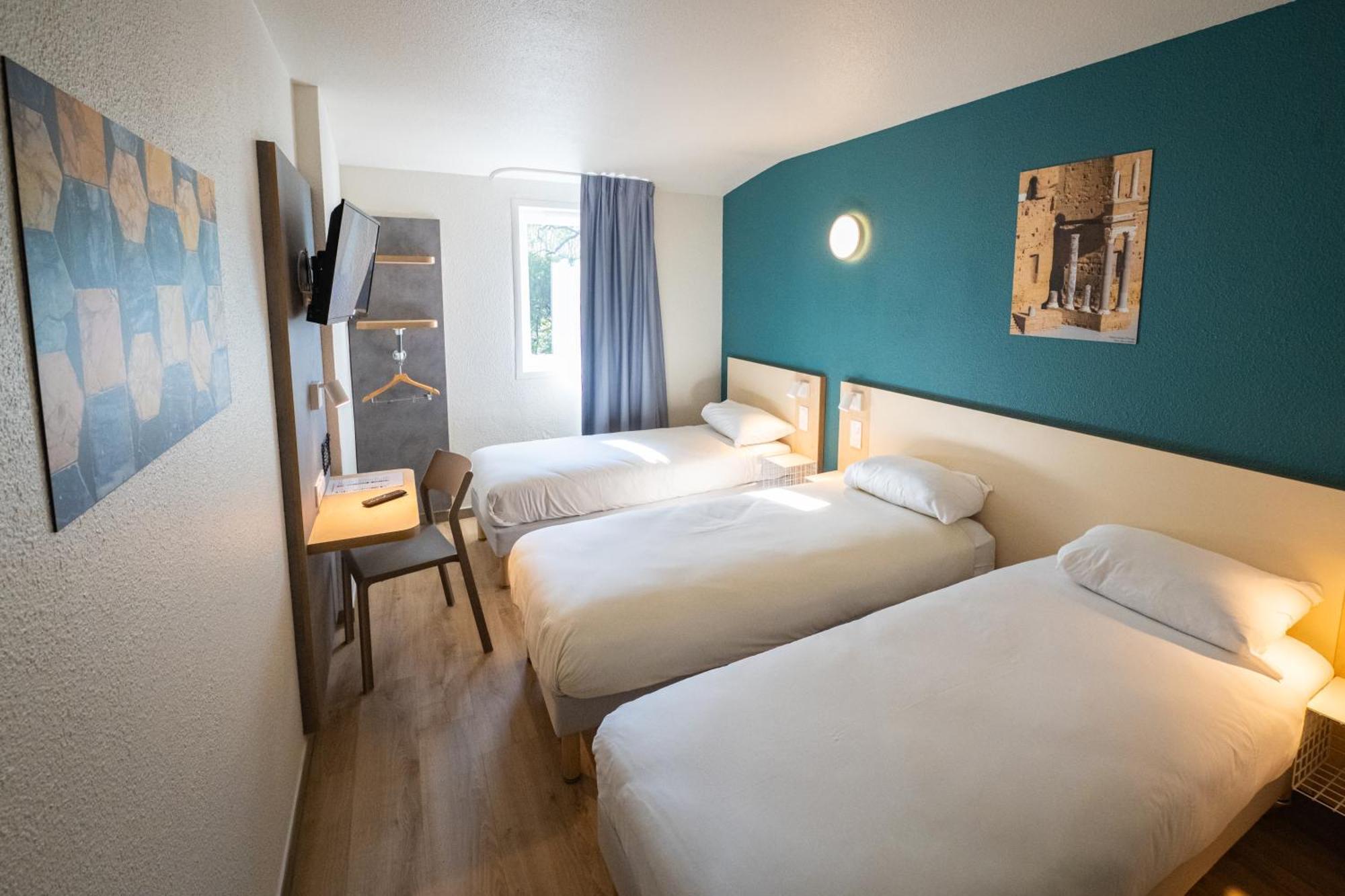 Driepersoonskamer met 3 Eenpersoonsbedden