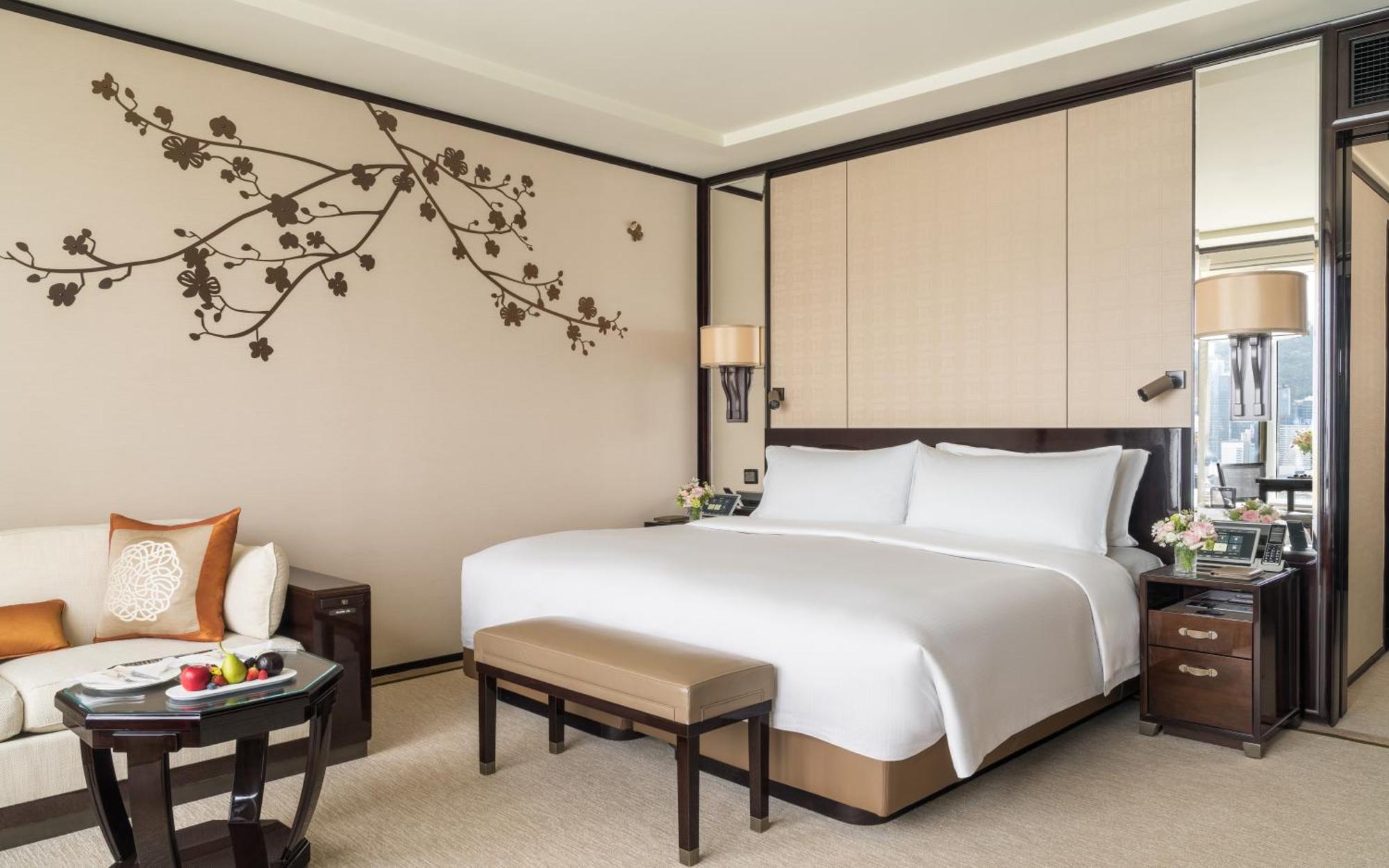 Habitación Grand Deluxe con cama extragrande y vistas al puerto