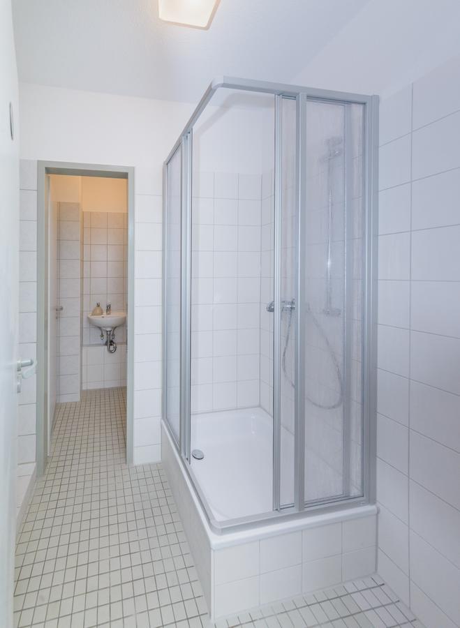 Comfort Vierbettzimmer mit Balkon und Gemeinschaftsbad